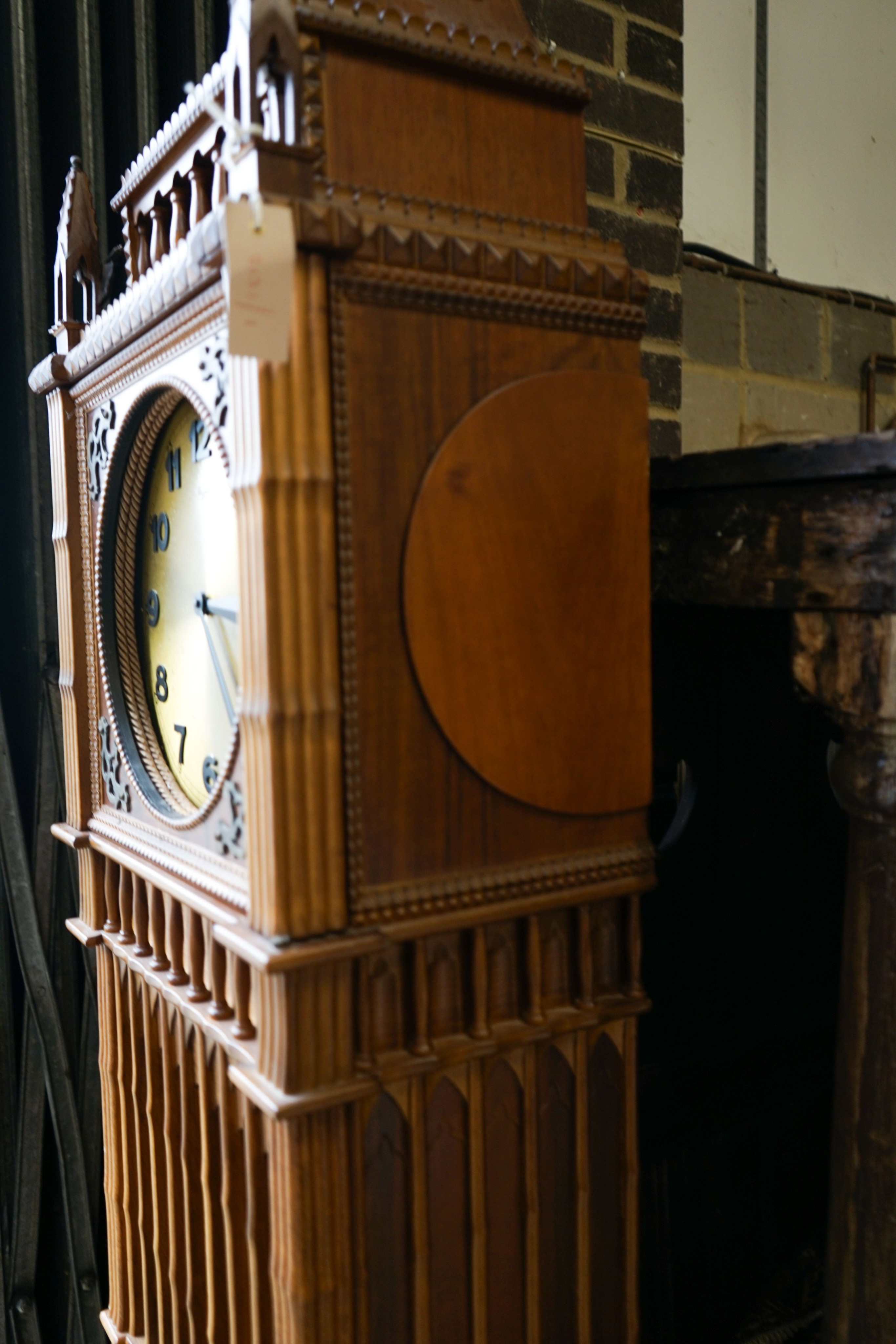 A mid 20th century architectural longcase clock, dial marked, 'Urgos', height 248cm